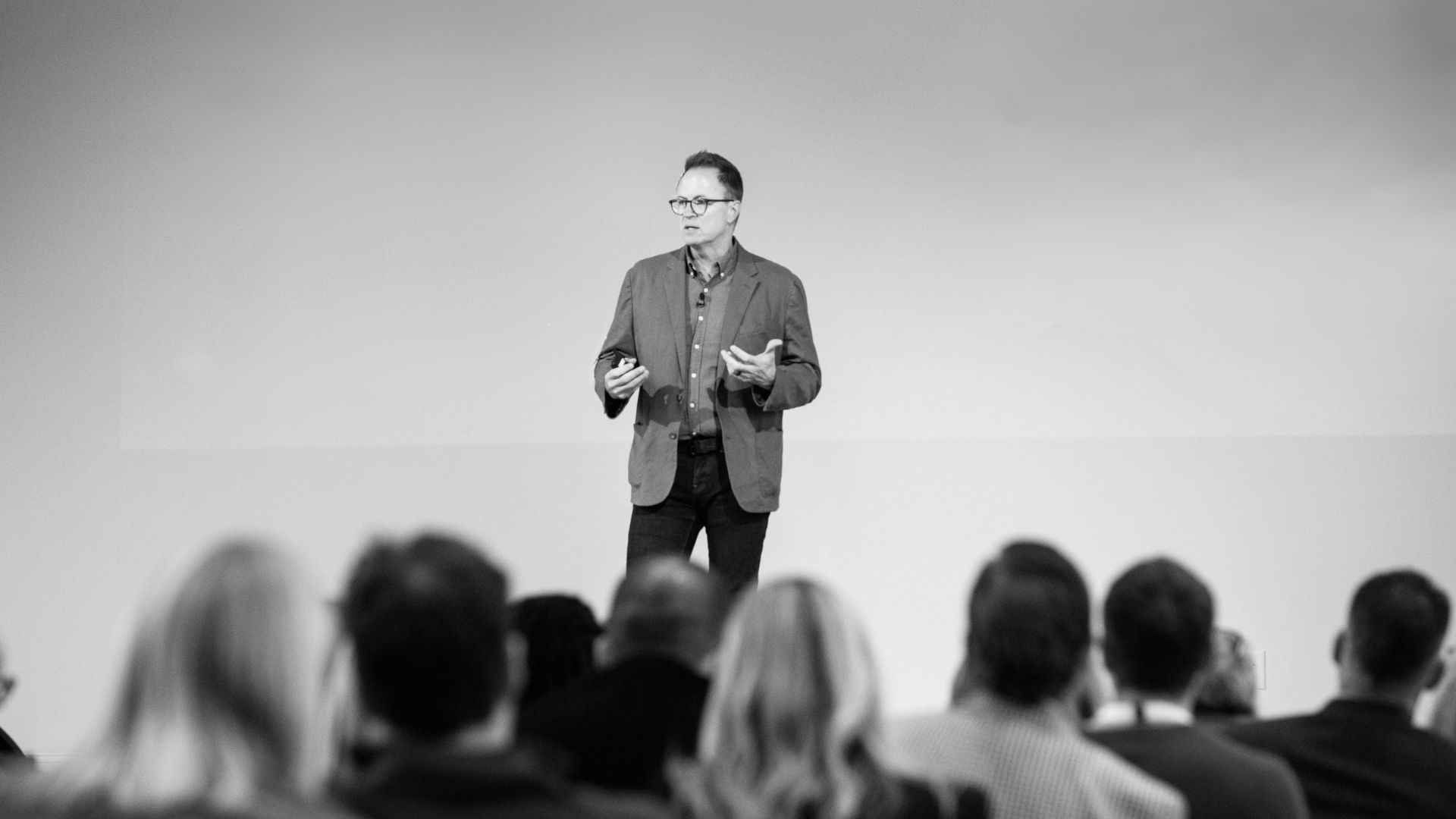 Bob Hutchins speaking on stage